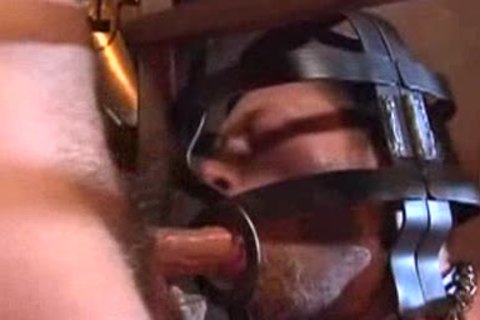 Caged guy and a 3 some